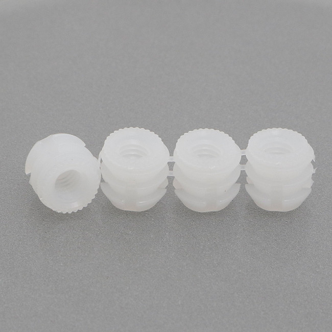 TUERCA DE NILÓN EN TIRAS. ROSCA M6. FIJACIÓN POR INSERCIÓN. DIÁMETRO 11MM. PARA TALADRO 10MM. TIRAS DE 12 PIEZAS